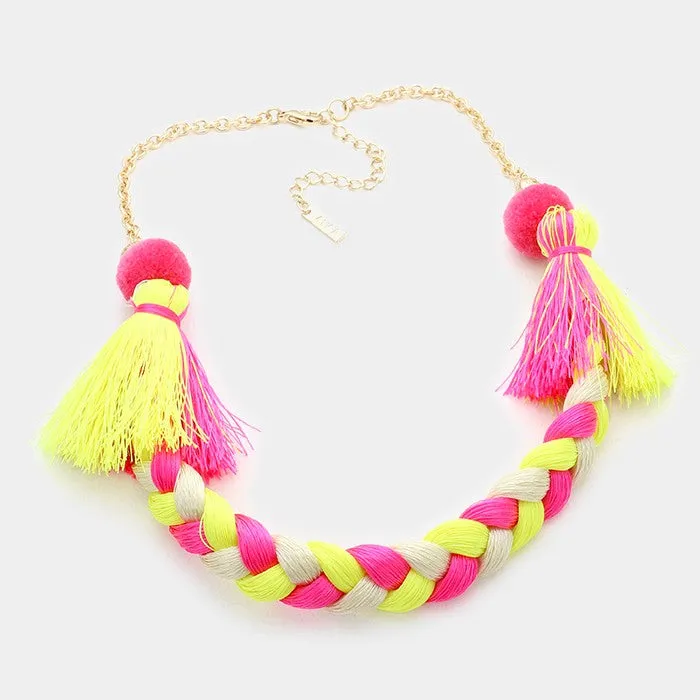 iLLASPARKZ Braided thread necklace with pom pom tassels