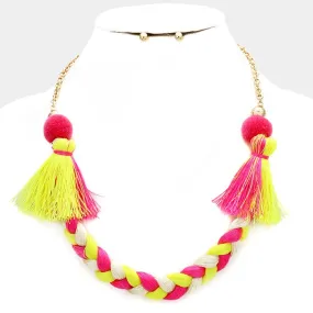 iLLASPARKZ Braided thread necklace with pom pom tassels