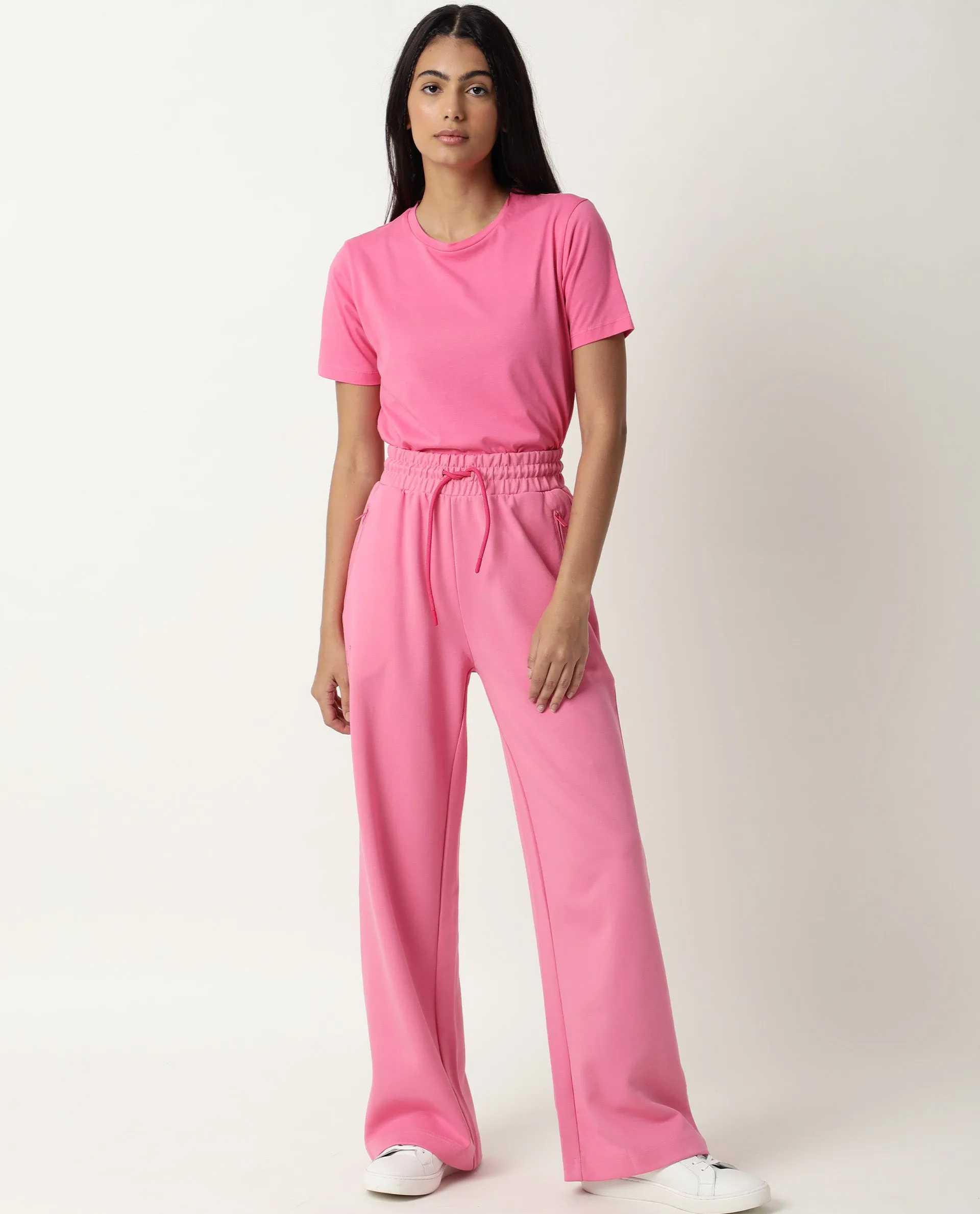 Rareism Women Capsule Flouroscent Pink Cotton Blend Fabric Relaxed Fit Solid Mid Rise Ankle Length Track Pant